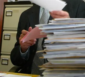 Open book showing why you need a staff handbook